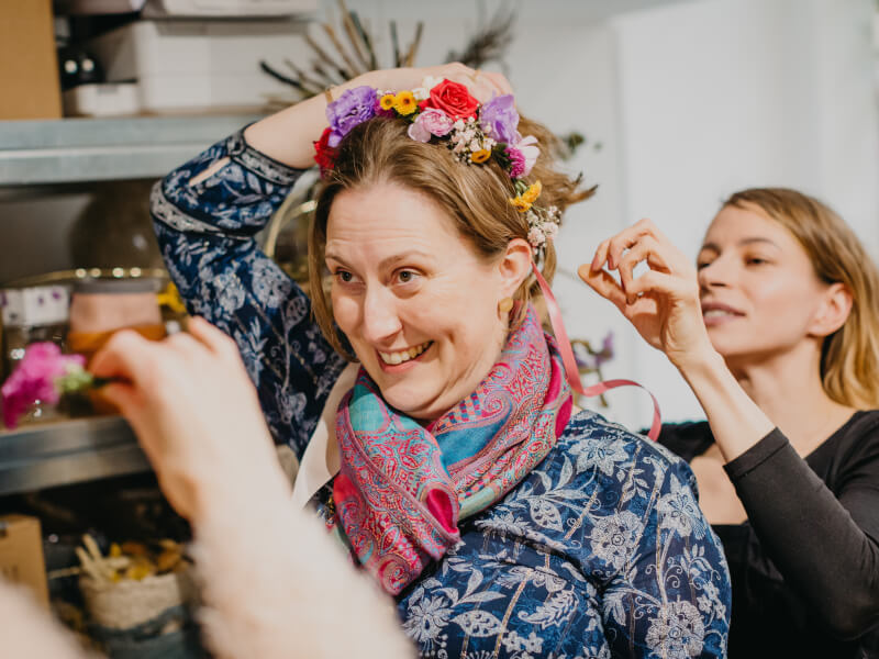 woman smiling with flower crown